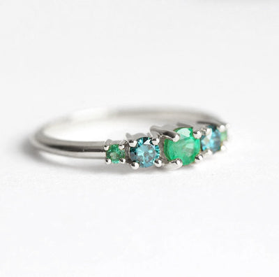 Round Emerald Cluster Ring with 2 Side Blue Diamonds and 2 Side Round Emeralds