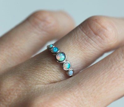 White Round Opal Side Stone Ring with 4 Additional Opal Gemstones
