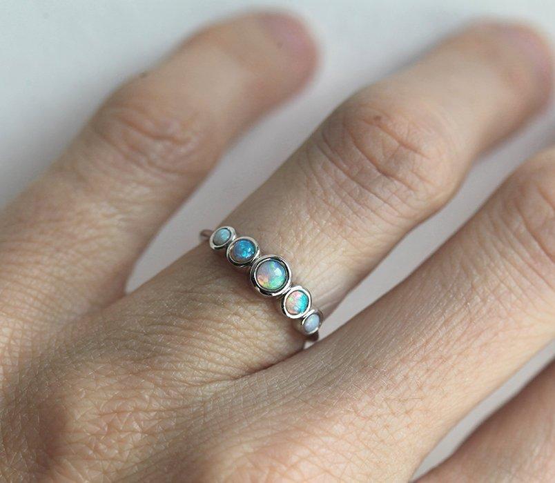 White Round Opal Side Stone Ring with 4 Additional Opal Gemstones