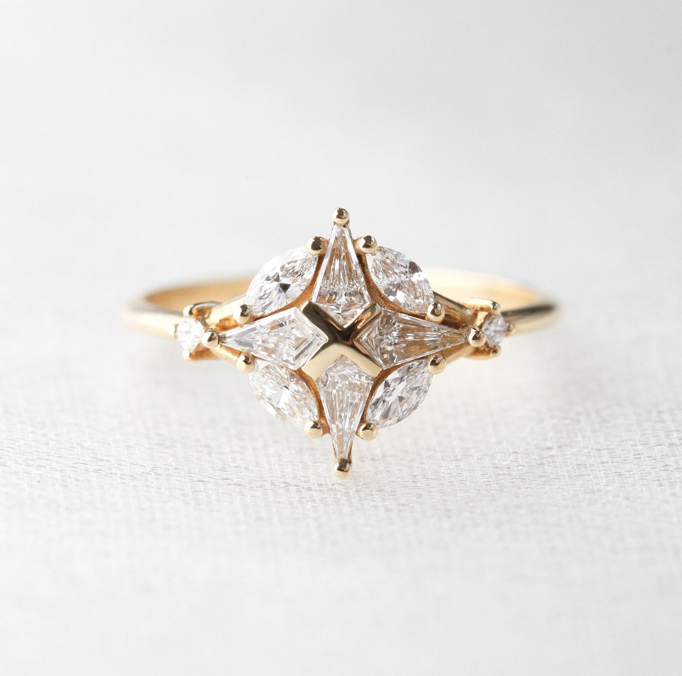 Kite- and Marquise-cut White Diamond Ring with Compass-like design