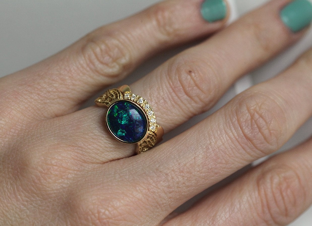 Black Oval Opal Gold Ring Set with Opal as Centerpiece Adorned By Vintage Lace On The Sides And A Diamond Lace Band