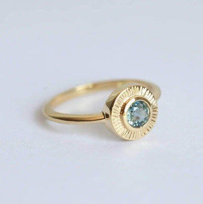 Round blue sapphire ring