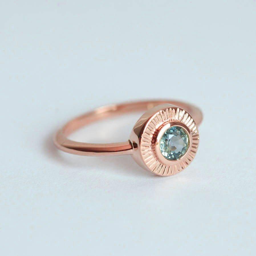 Round blue sapphire ring