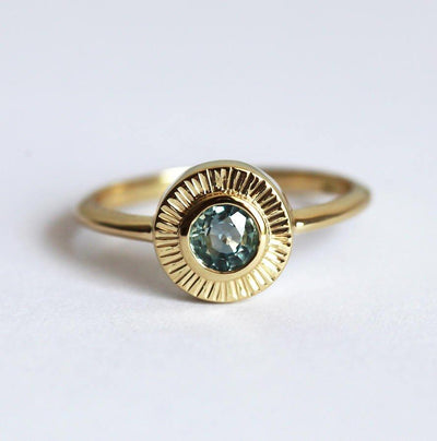 Round blue sapphire ring