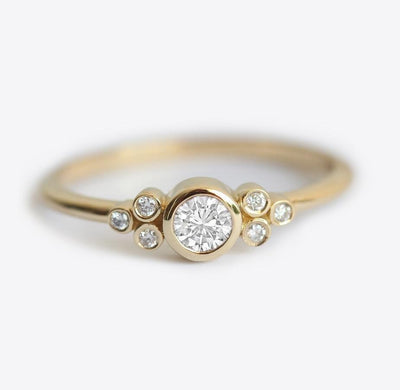 Stylish curved flush diamond nesting band ring featuring a unique design.