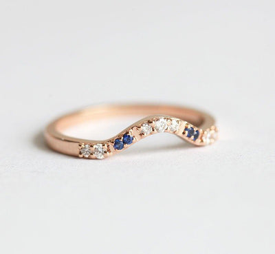 Curved pave diamond and blue sapphire wedding ring