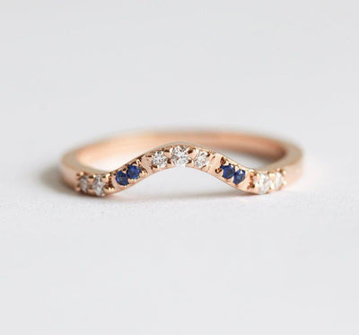 Curved pave diamond and blue sapphire wedding ring