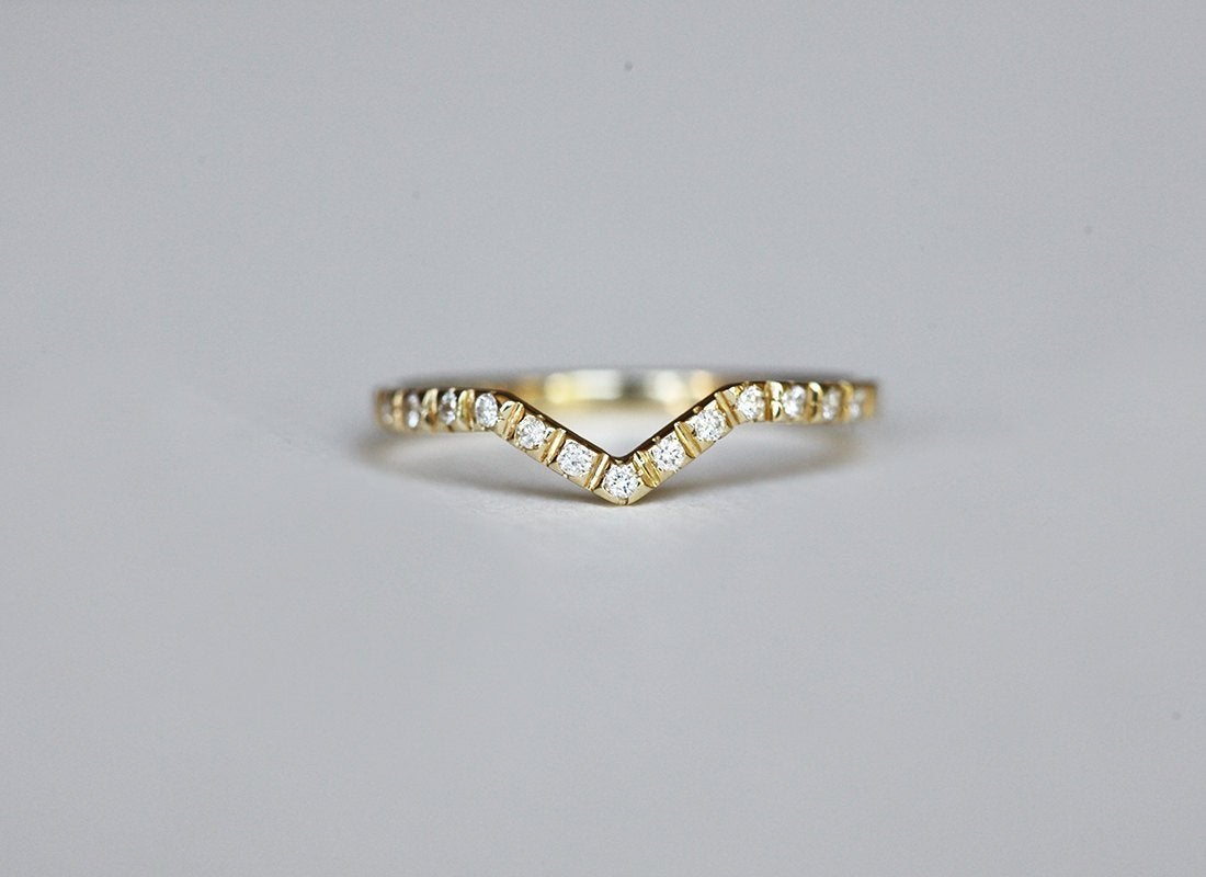 Gold Curved Wedding Band Featuring Pave White Diamonds