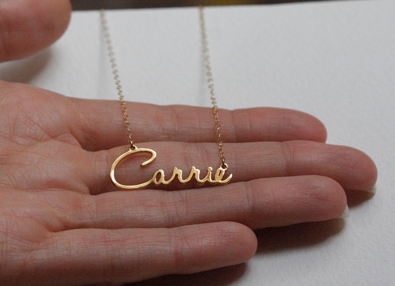 Gold necklace with personalized name