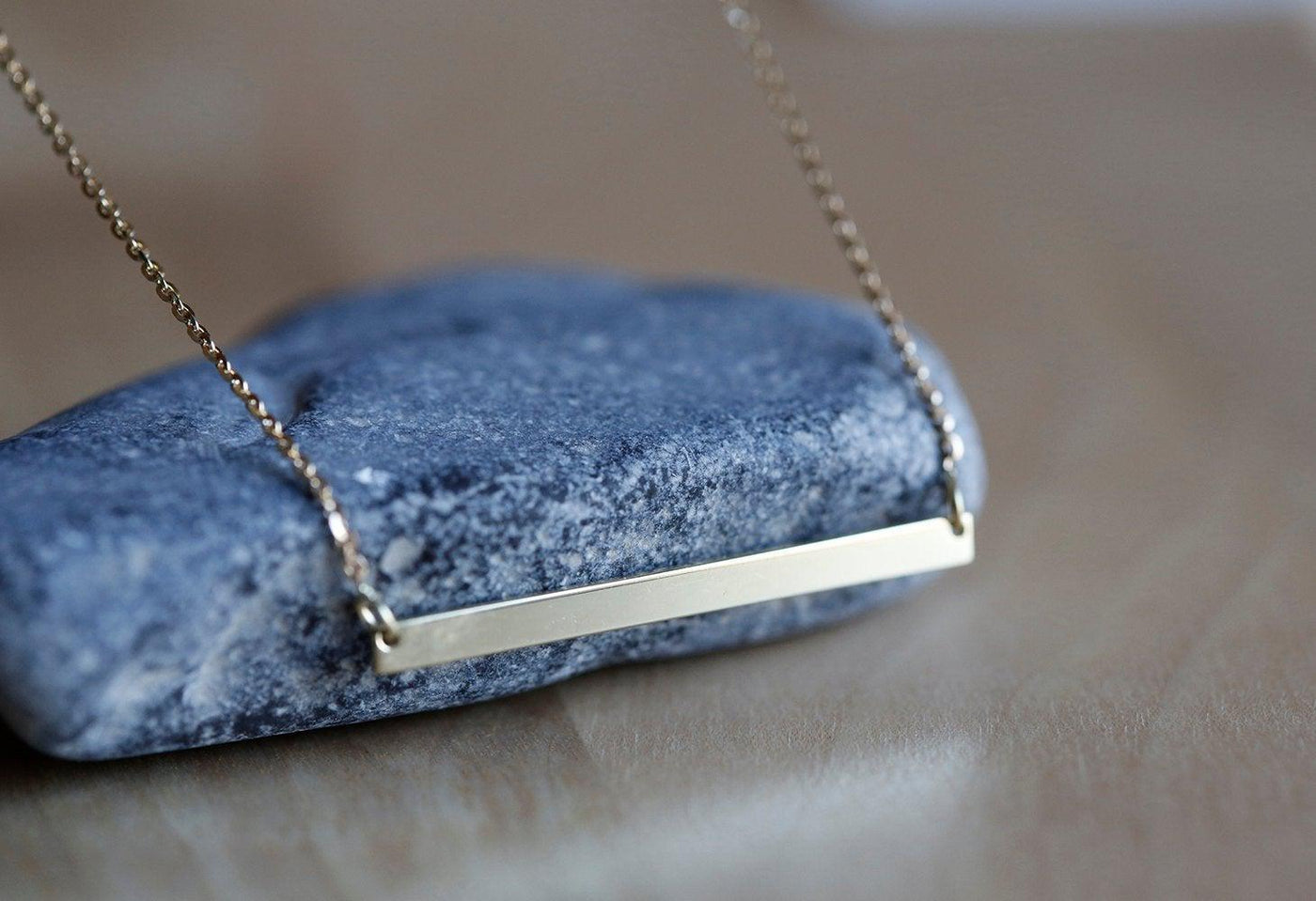 Gold bar necklace with personalized engraved nameplate