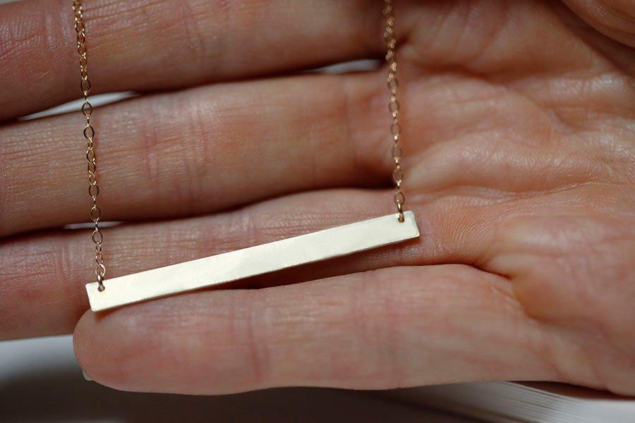 Gold bar necklace with personalized engraved nameplate