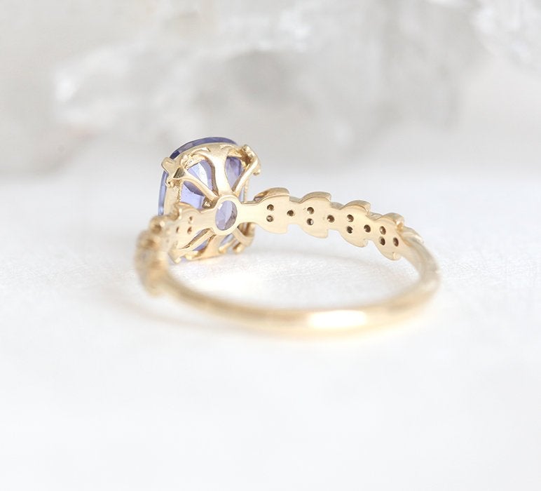 Cushion-cut lavender sapphire ring with side diamonds