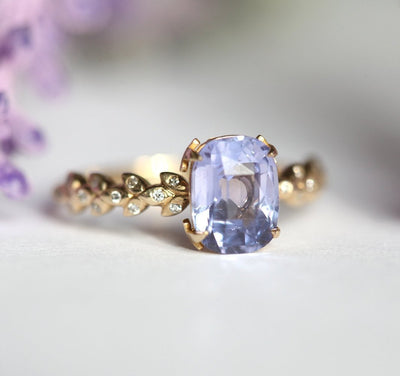 Cushion-cut lavender sapphire ring with side diamonds