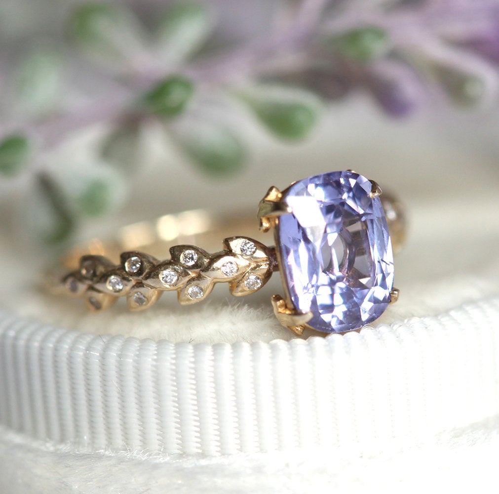 Cushion-cut lavender sapphire ring with side diamonds