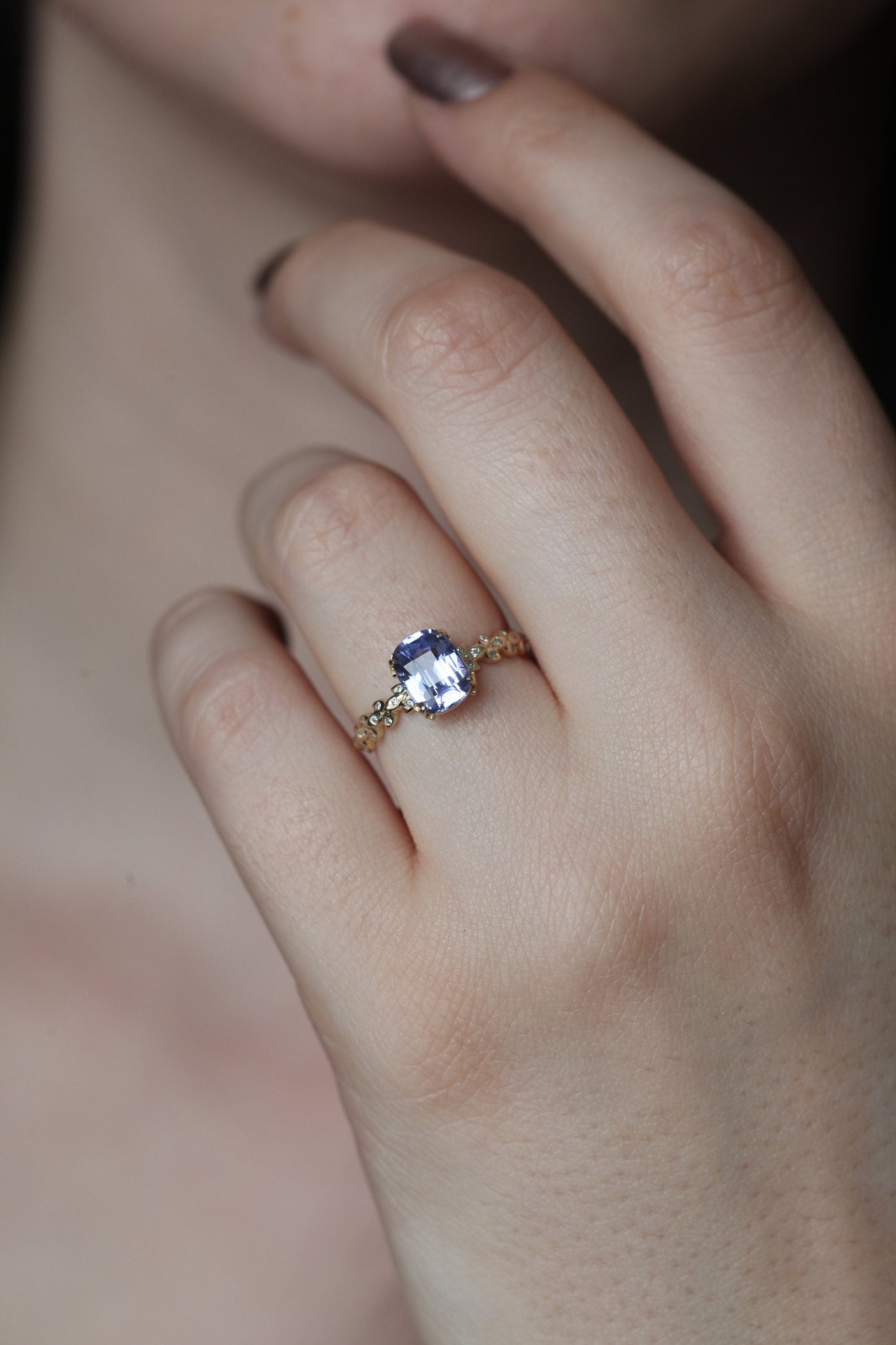 Cushion-cut lavender sapphire ring with side diamonds