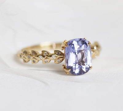 Cushion-cut lavender sapphire ring with side diamonds