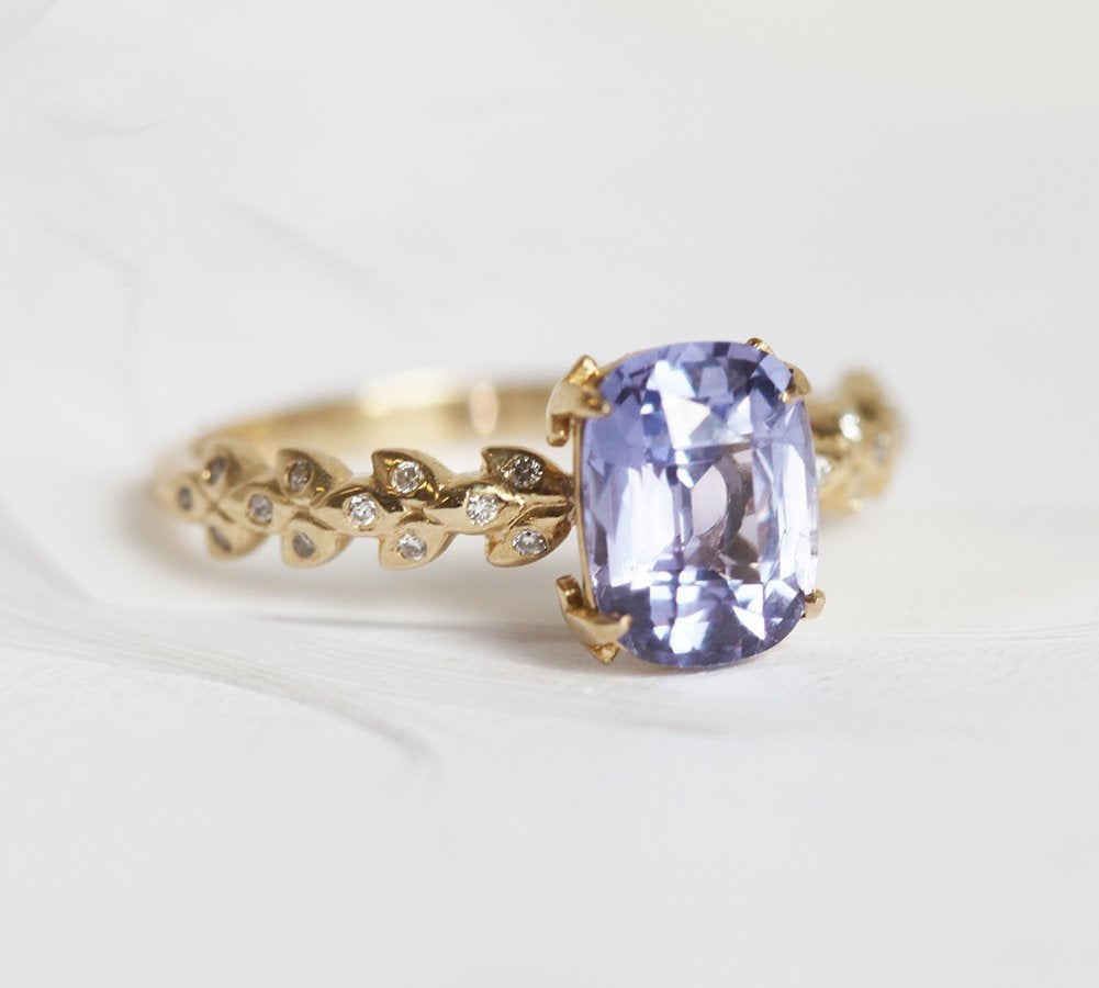 Cushion-cut lavender sapphire ring with side diamonds