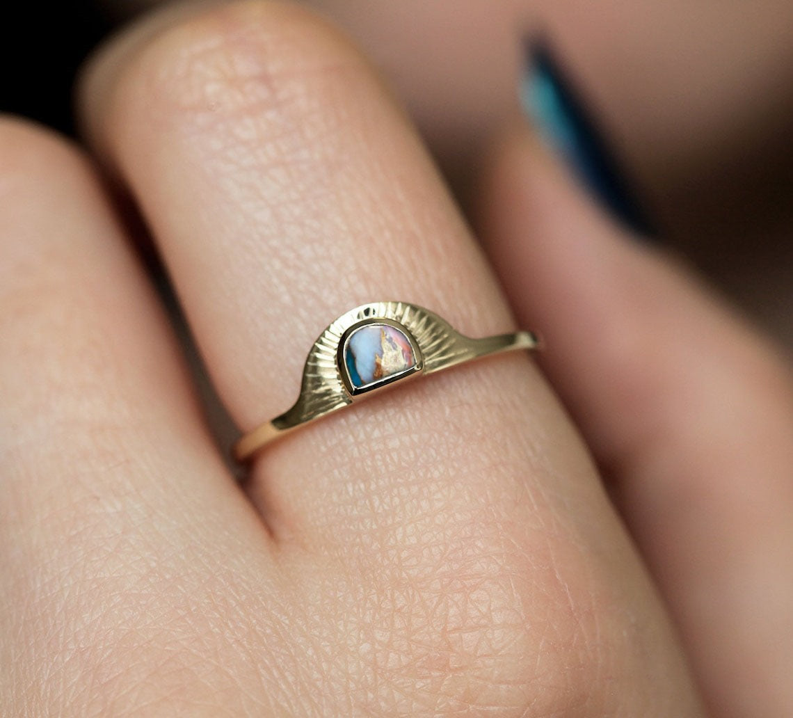 Stylish moss agate half-moon ring with a sunset design and modern look.