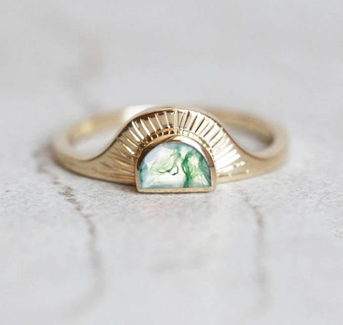 Unique moss agate half-moon ring with a sunset design.