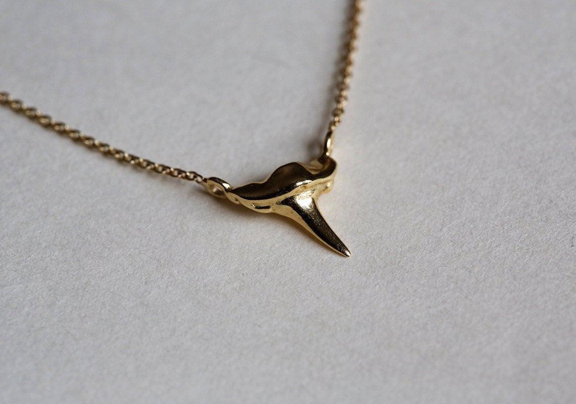 Gold shark tooth necklace