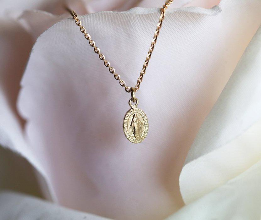 Gold virgin Mary medallion necklace