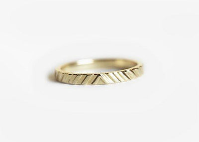 Textured gold wedding band