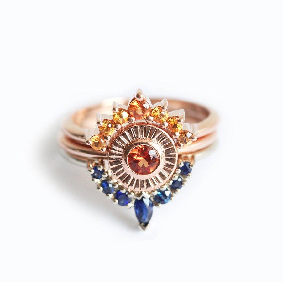 Round orange sapphire ring