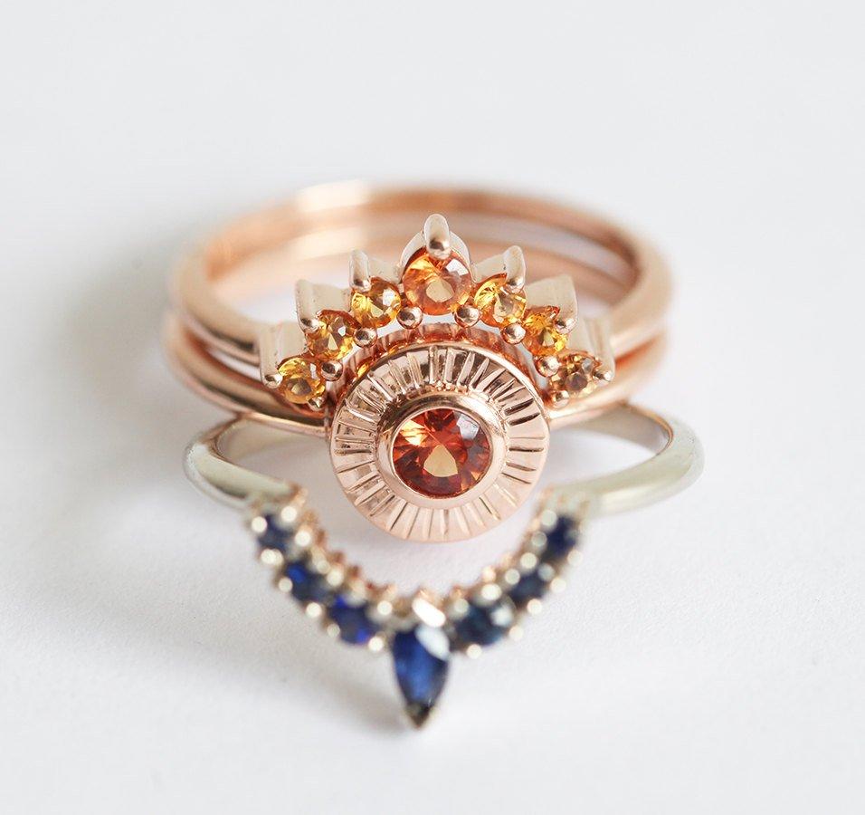 Round orange sapphire ring