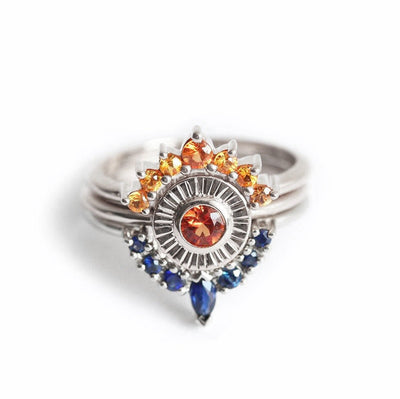 Round orange sapphire ring