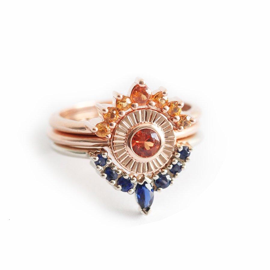 Round orange sapphire ring