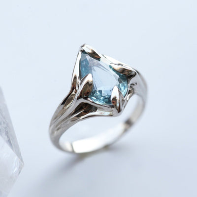Pear-shaped light blue sapphire ring