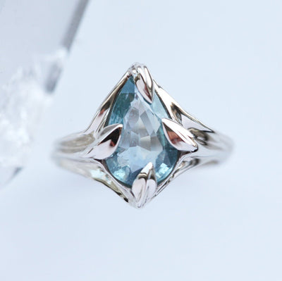 Pear-shaped light blue sapphire ring
