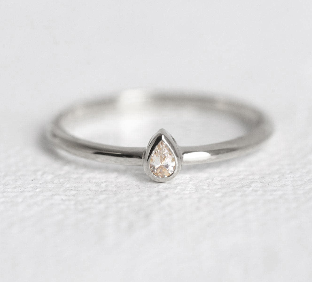 Simple Pear Cut White Diamond Solitaire Gold Ring