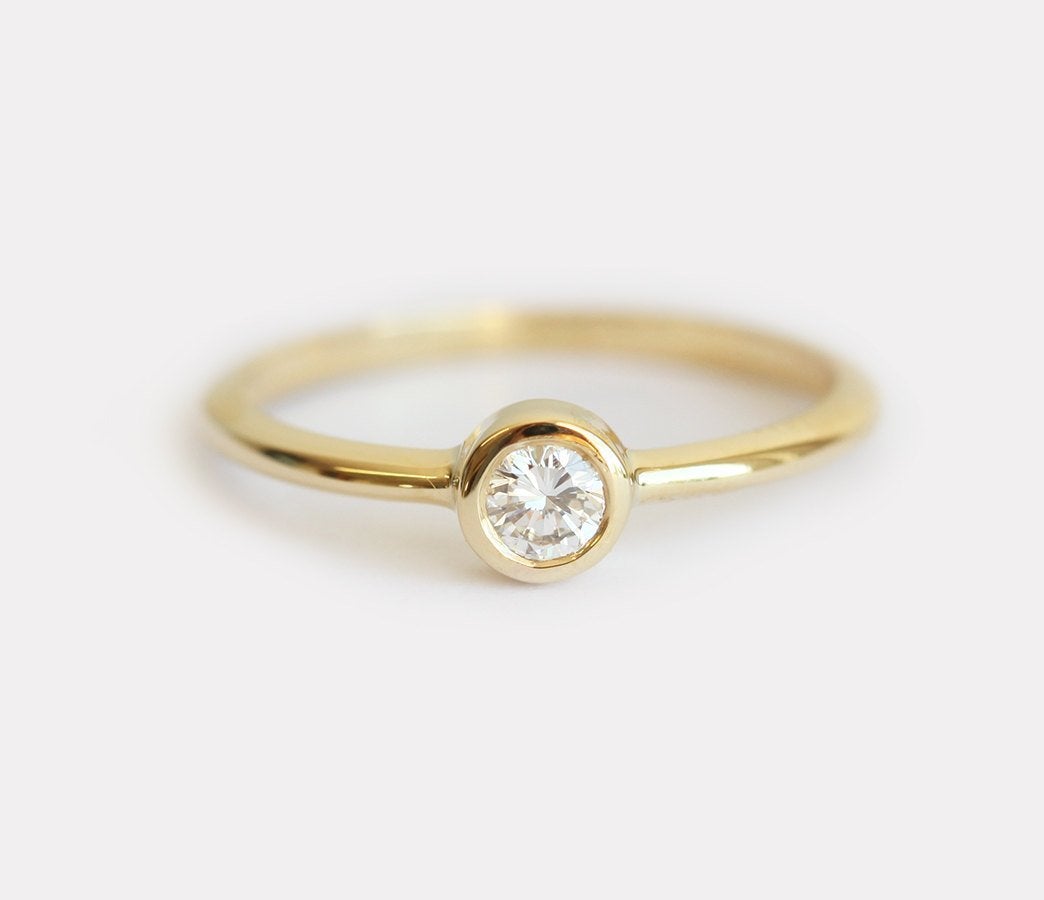 Simple Round White Diamond Solitaire Engagement Ring