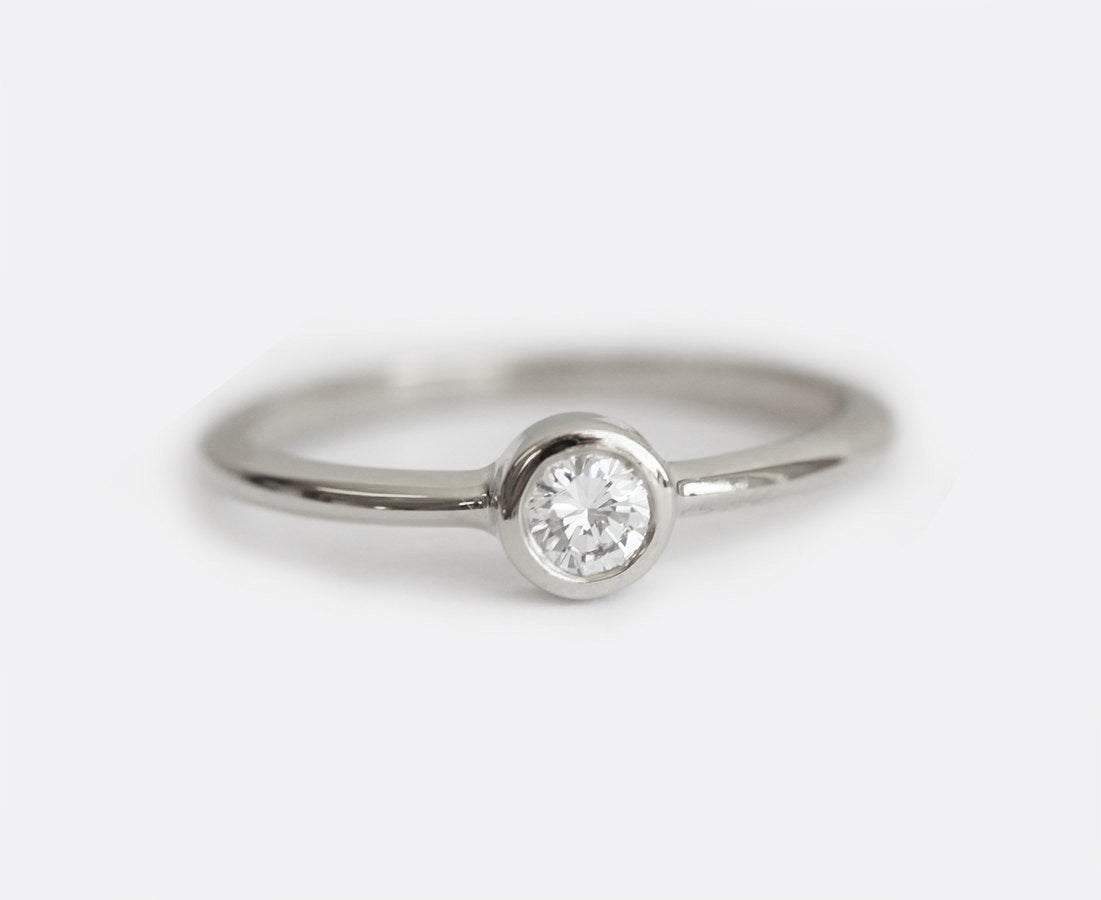 Simple Round White Diamond Solitaire Engagement Ring