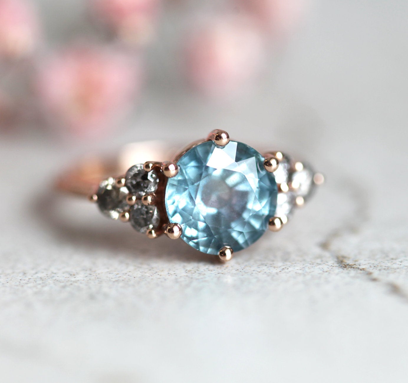 Round blue sapphire ring with side diamonds