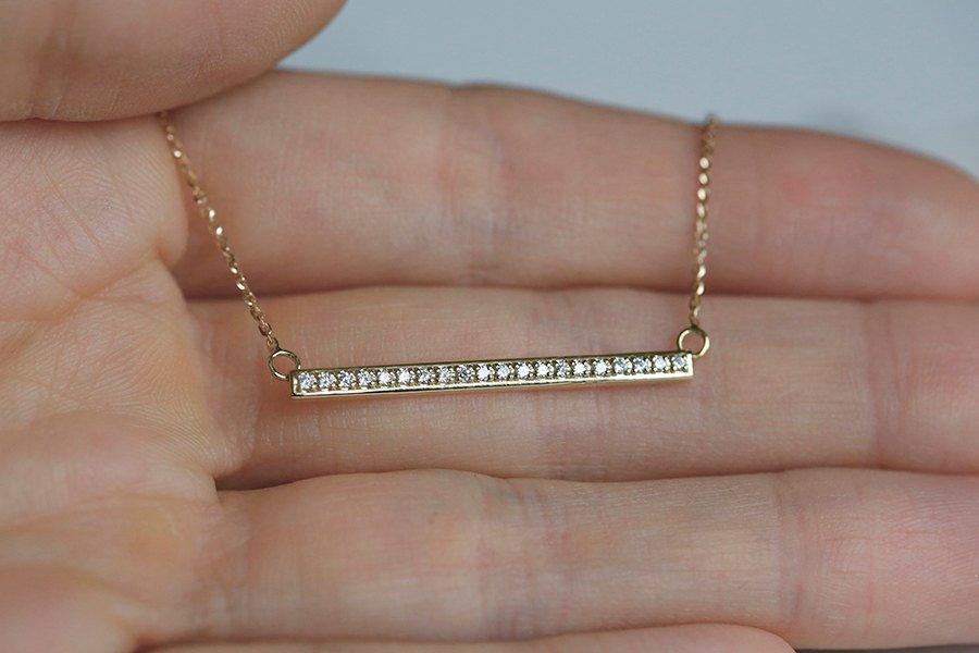 Gold bar necklace with white diamond pave