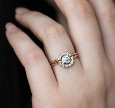 Feminine Round White Diamond Bridal Halo Ring with small White Round Diamonds