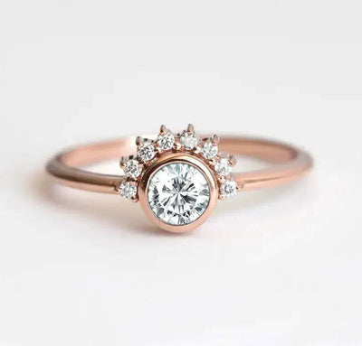 Feminine Round White Diamond Bridal Halo Ring with small White Round Diamonds
