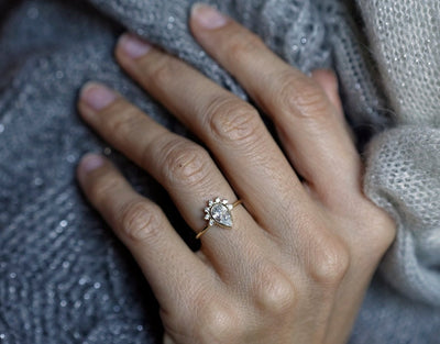 Pear White Diamond Halo Engagement Ring with Side White Diamonds