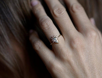 Pear White Diamond Halo Engagement Ring with Side White Diamonds