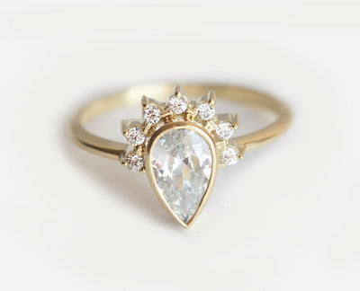 Pear White Diamond Halo Engagement Ring with Side White Diamonds