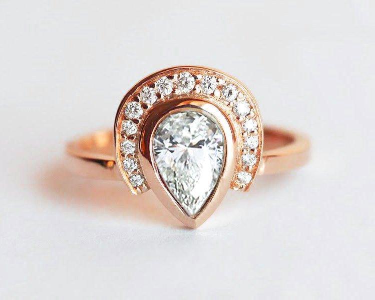 Pear White Diamond Halo Engagement Ring with Side White Diamonds