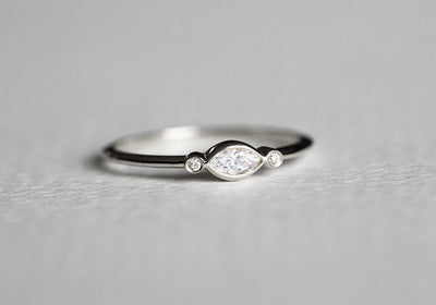 3-Stone Marquise-Cut White Diamond Engagement Ring with 2 Side Round White Diamonds