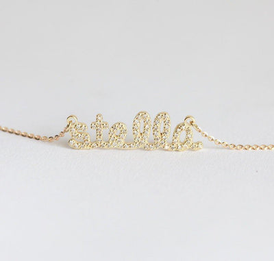 Gold necklace with personalized name and diamond pave