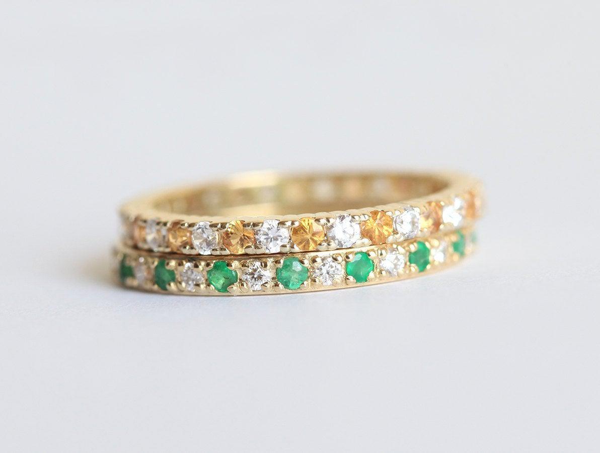 Diamond and orange sapphire eternity ring