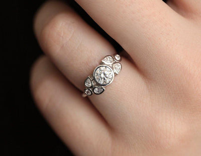 Round and Pear Cut White Diamond Cluster Engagement Ring