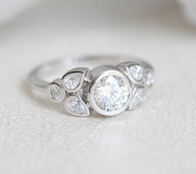 Round and Pear Cut White Diamond Cluster Engagement Ring