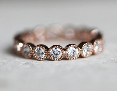 Round White Diamonds Scalloped in an Eternity Wedding Band