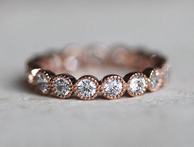 Round White Diamonds Scalloped in an Eternity Wedding Band